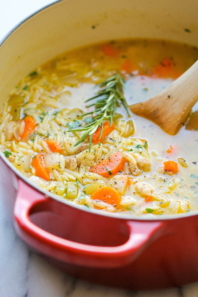 Lemon Chicken Orzo Soup - Chockfull of hearty veggies and tender chicken in a refreshing lemony broth - it's pure comfort in a bowl!