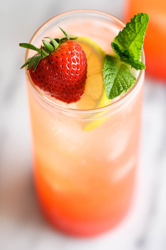 Sparkling Strawberry Lemonade - Wonderfully sweet, tangy, refreshing and bubbly. Plus, it's so easy and inexpensive to make right at home!