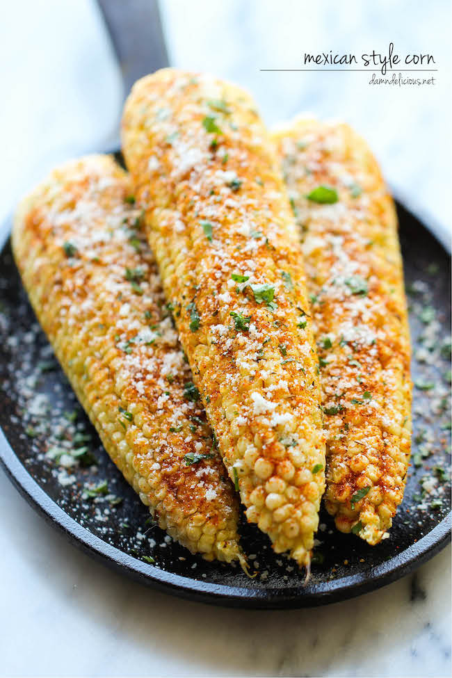 Mexican Corn on the Cob - This is the best way to serve corn, brushed with melted butter and sprinkled with chili powder, cheese and lime!