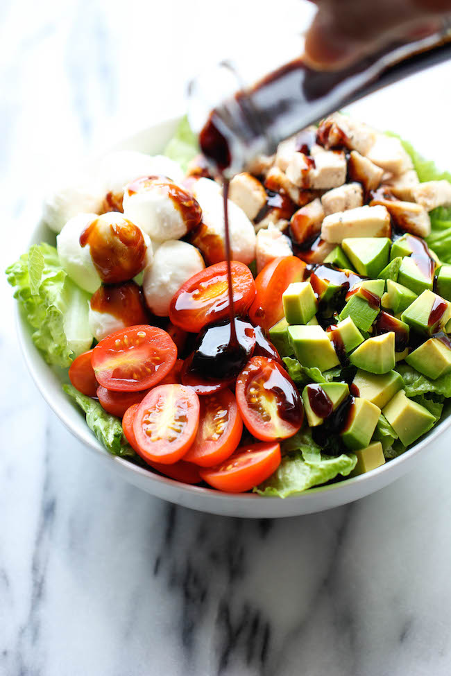 Caprese Avocado Salad - A light, refreshing salad loaded with mozzarella, tomatoes, basil and avocado with a sweet balsamic reduction!