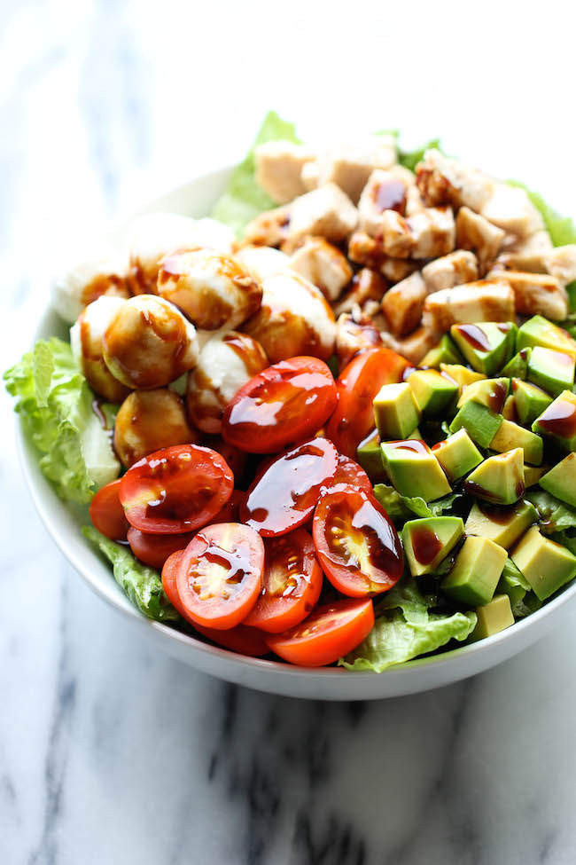 Caprese Avocado Salad - A light, refreshing salad loaded with mozzarella, tomatoes, basil and avocado with a sweet balsamic reduction!