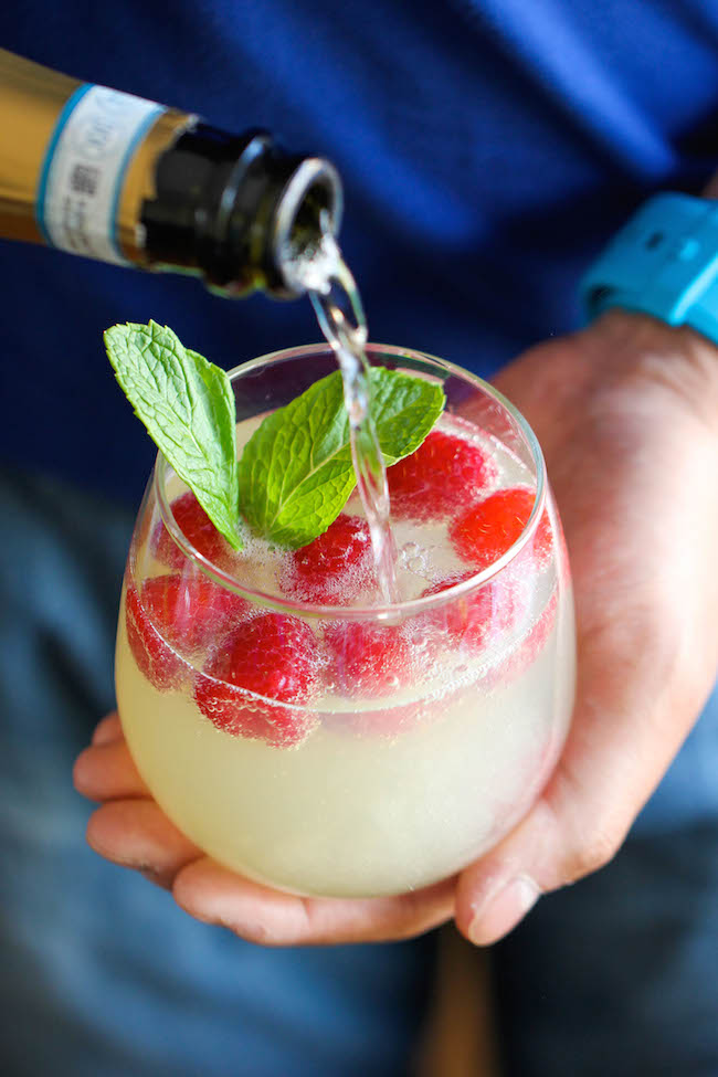 Raspberry Limoncello Prosecco - Amazingly refreshing, bubbly, and sweet - a perfect summer cocktail that you can make in just 5 minutes!