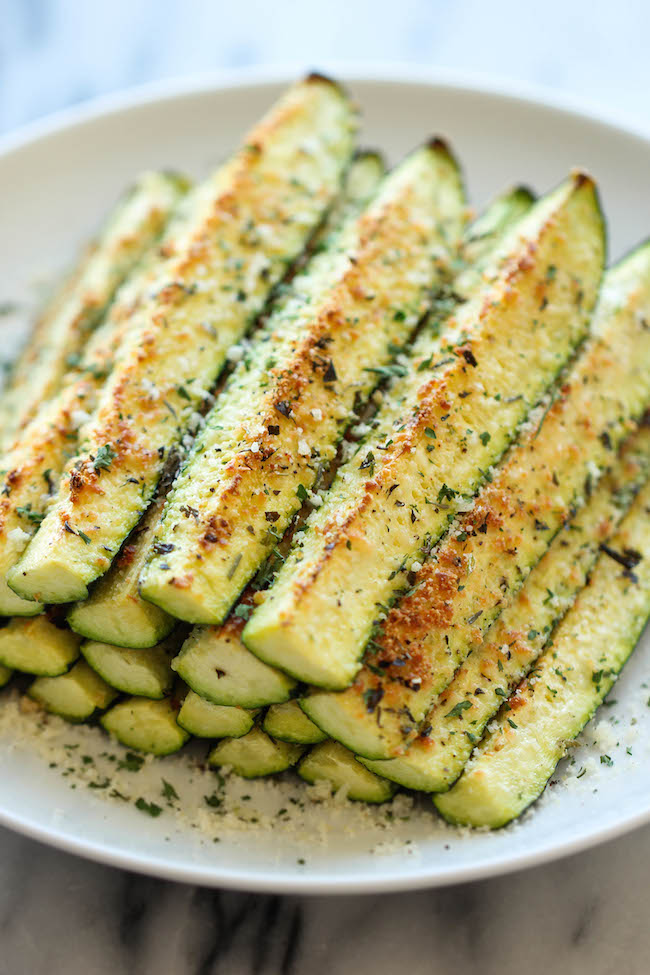 Baked Parmesan Zucchini - Crisp, tender zucchini sticks oven-roasted to perfection. It's healthy, nutritious and completely addictive!