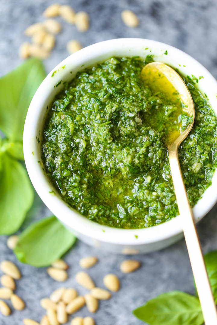 Easy Homemade Pesto - No need for store-bought pesto anymore. This recipe is so easy with just 5 ingredients. And it takes just 5 min to make too!