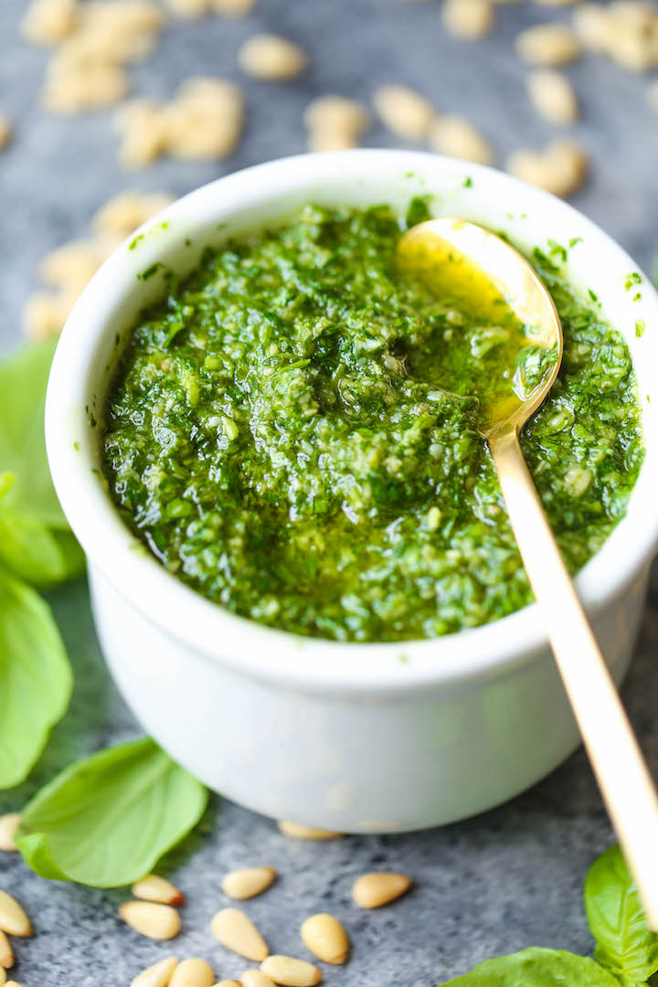 Easy Homemade Pesto - No need for store-bought pesto anymore. This recipe is so easy with just 5 ingredients. And it takes just 5 min to make too!