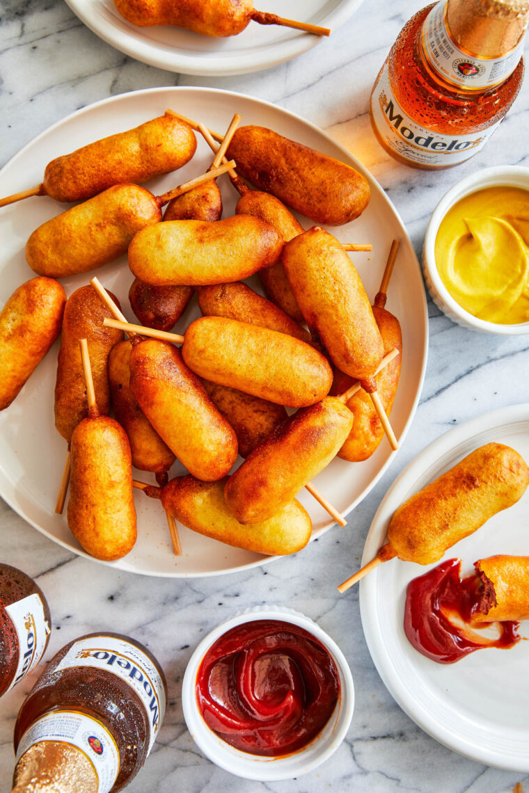 Easy Homemade Mini Corn Dogs - the best corn dogs you can make at home - are just as delicious as the State Fair.  Be sure to be family friendly!