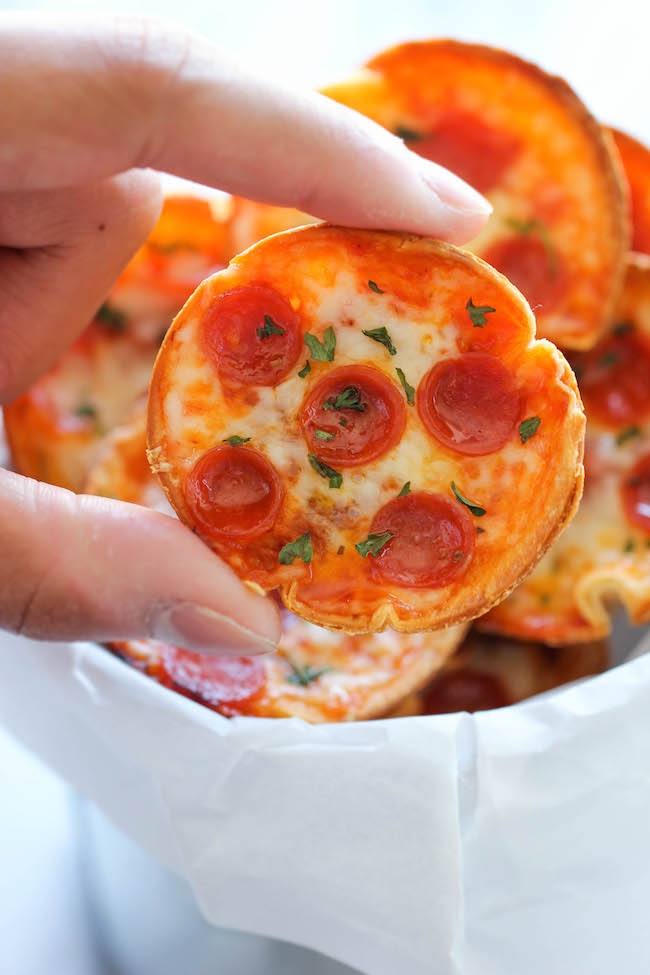 Mini Deep Dish Pizzas - These 5-ingredient mini pizzas are unbelievably easy, fool-proof, and completely addicting! Perfect for game day!