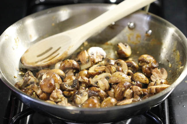 Baked Chicken and Mushroom Skillet - The most flavorful chicken topped with the creamiest mushroom sauce. An easy meal for those busy weeknights!