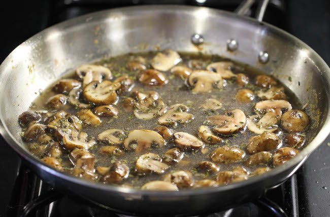 Baked Chicken and Mushroom Skillet - The most flavorful chicken topped with the creamiest mushroom sauce. An easy meal for those busy weeknights!