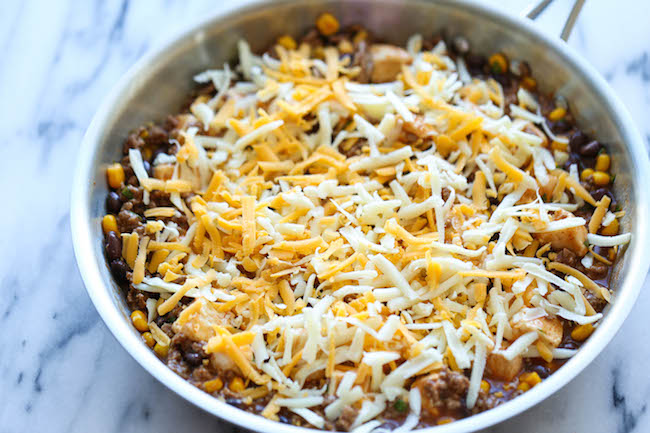 One Pan Enchilada Bake - The easiest and cheesiest enchilada bake made in a single pan - easy peasy with only one dirty pot. You can't beat that!