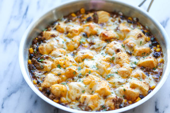 One Pan Enchilada Bake - The easiest and cheesiest enchilada bake made in a single pan - easy peasy with only one dirty pot. You can't beat that!