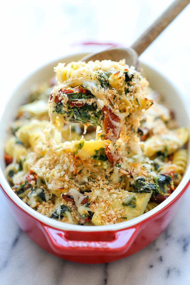 Chicken Florentine Artichoke Bake - An easy weeknight casserole with chicken, artichokes, spinach and sun-dried tomatoes - and all you need is 10 min prep!