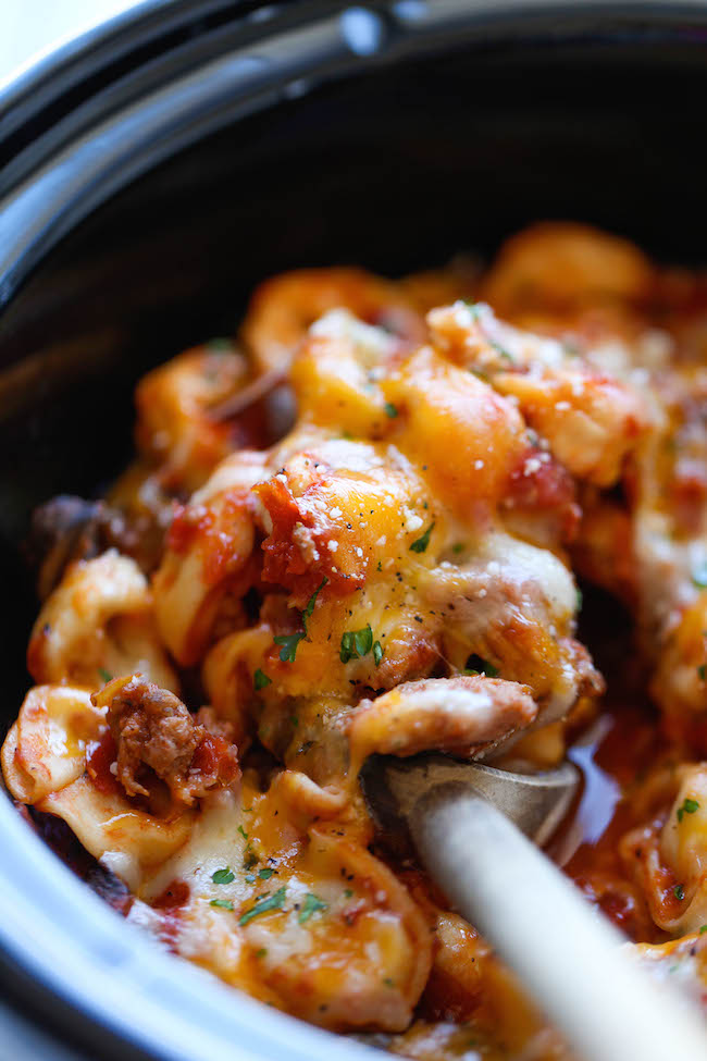 Slow Cooker Cheesy Tortellini - There's nothing better than coming home to the cheesiest tortellini ever, and yes, it's easily made right in the crockpot!