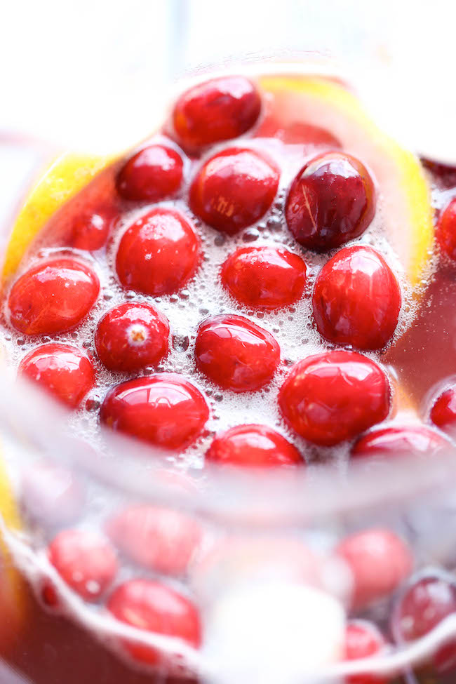 Cranberry Punch - A super easy, refreshing drink so perfect for the holidays! And you can even make this an alcoholic drink for the grown-ups!