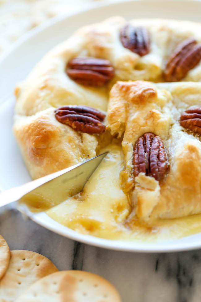 Pumpkin Pecan Baked Brie - The easiest baked brie ever! All you need is 5 min prep, but be warned that you'll probably want to make this all year long!