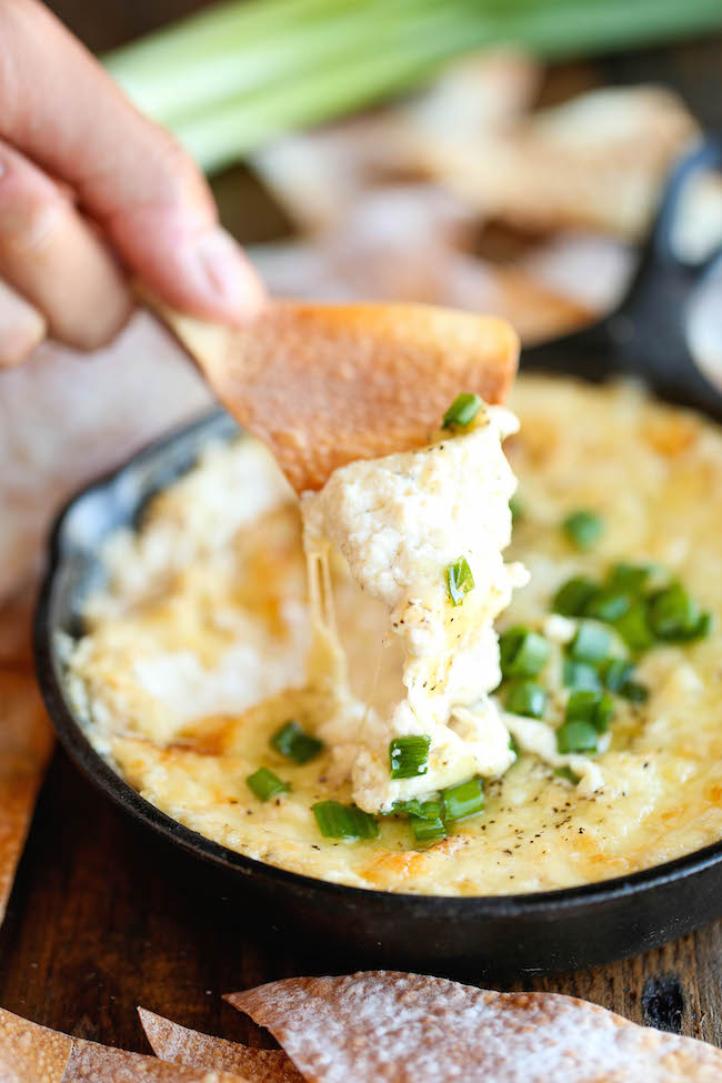 Crab Rangoon Dip - A take-out favorite made into the creamiest, cheesiest dip of all, served with the easiest homemade wonton chips!