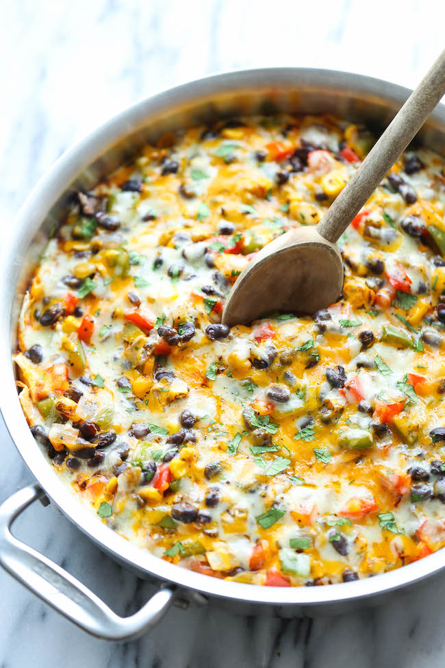 Skinny Mexican Casserole - A cheesy comforting casserole that you can enjoy guilt-free, chockfull of veggies and whole wheat tortilla. You can't beat that!