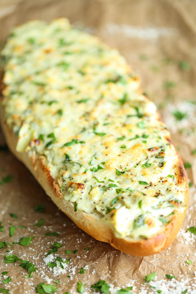 Spinach and Artichoke Dip French Bread - The classic spinach and artichoke dip is upgraded into the cheesiest, crustiest French bread ever!