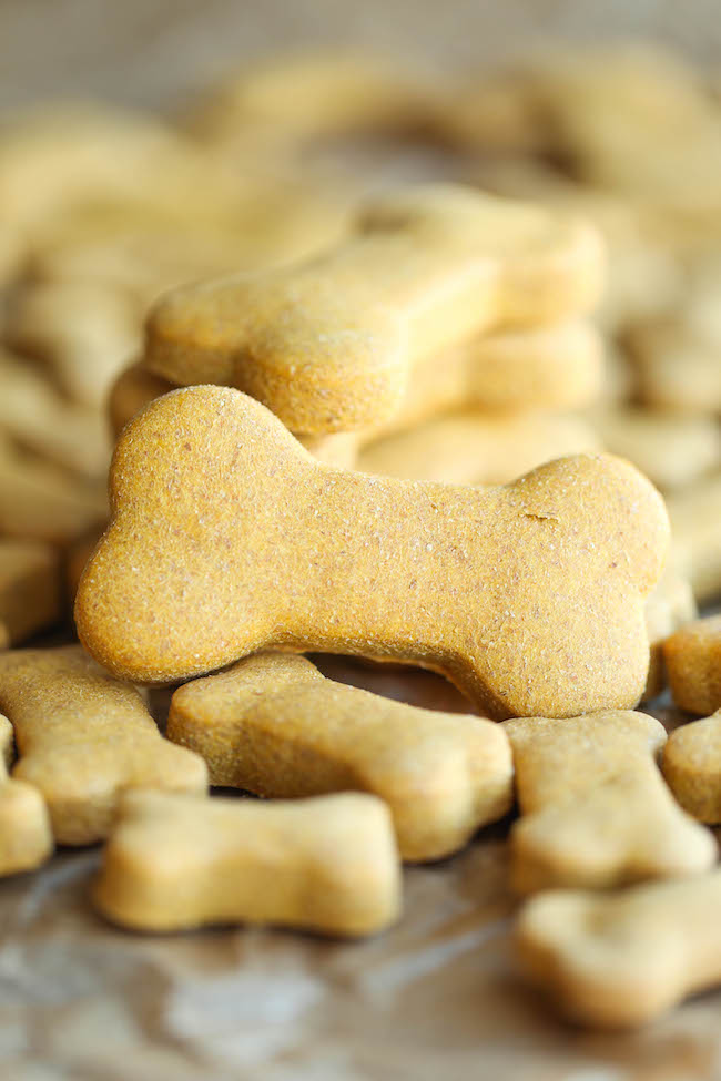 Homemade Peanut Butter Dog Treats - The easiest homemade dog treats ever - simply mix, roll and cut. Easy peasy, and so much healthier than store-bought!