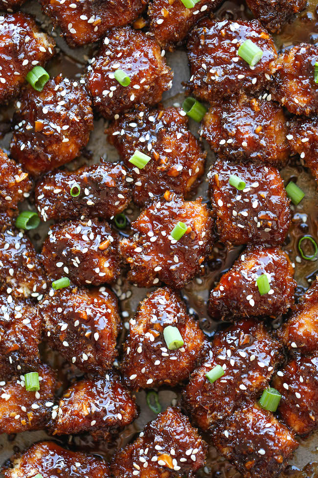 Sticky Garlic Chicken Bites - These easy baked chicken nuggets are sweet, sticky, and just finger-licking amazing!