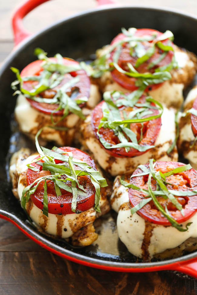 Baked Caprese Chicken - Amazingly crisp-tender chicken baked with melted mozzarella and topped with juicy tomatoes, fresh basil and balsamic reduction!