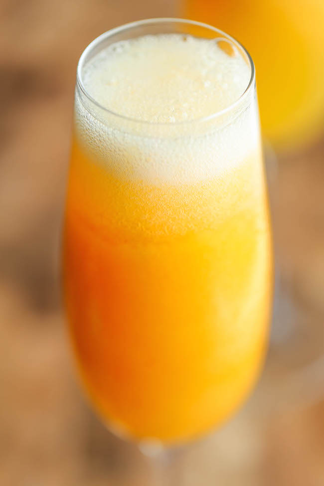 Frozen Peach Bellini - Wonderfully light, refreshing, and bubbly peach bellinis - and all you need is 3 ingredients and 5 minutes! So simple and easy!