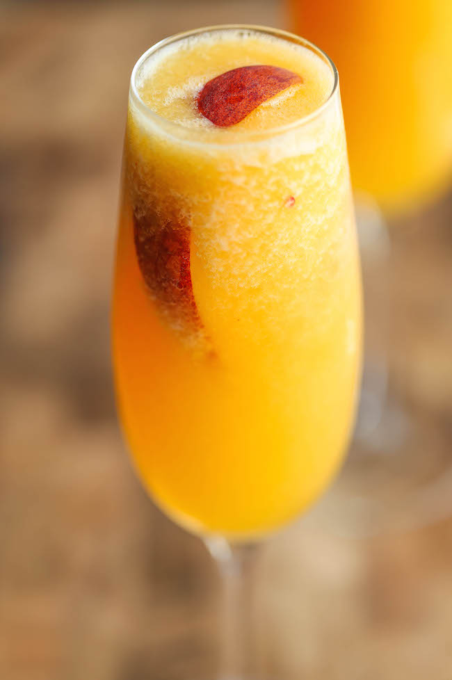 Frozen Peach Bellini - Wonderfully light, refreshing, and bubbly peach bellinis - and all you need is 3 ingredients and 5 minutes! So simple and easy!