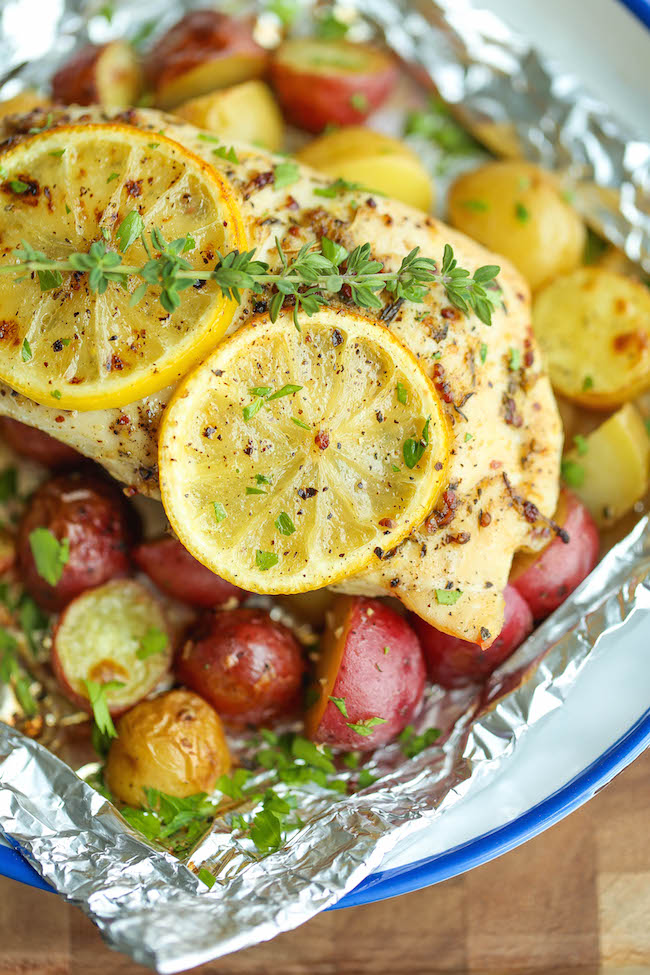 Lemon Chicken and Potatoes in Foil - The most amazingly moist and tender chicken breasts cooked in foil packets - so easy and packed with tons of flavor!