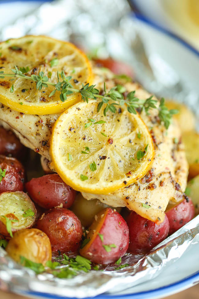 Lemon Chicken and Potatoes in Foil - The most amazingly moist and tender chicken breasts cooked in foil packets - so easy and packed with tons of flavor!