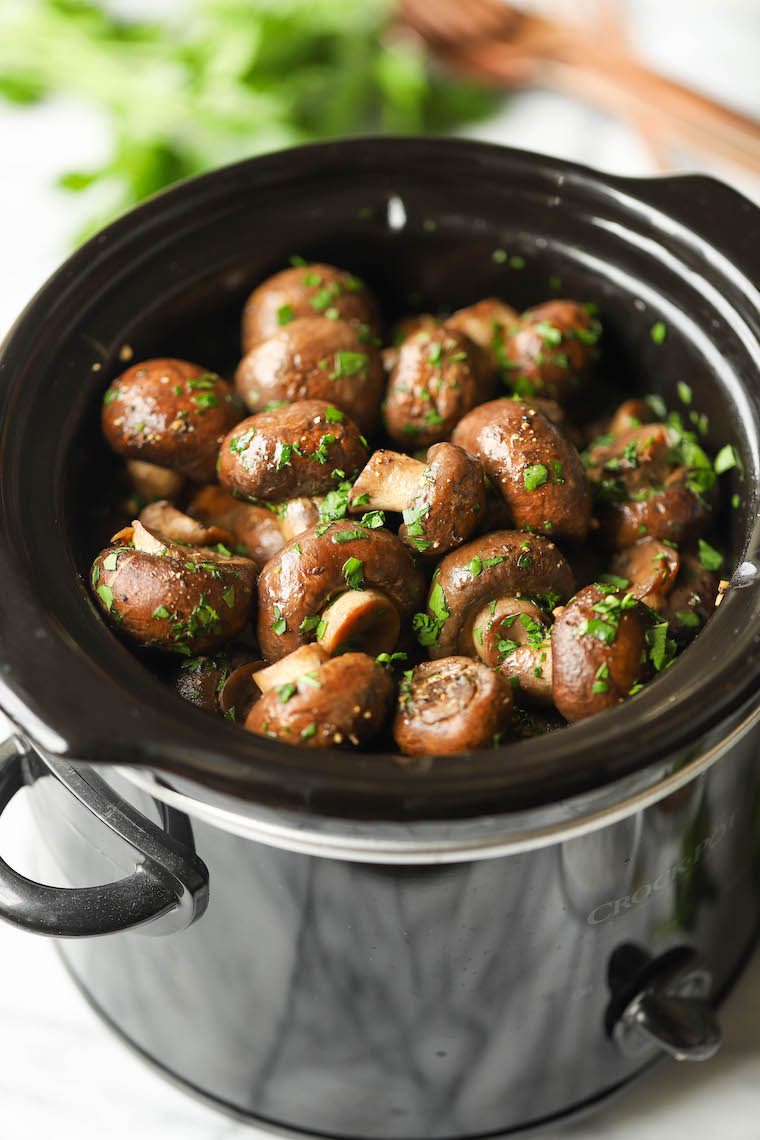 Slow Cooker Garlic Herb Mushrooms - The best and EASIEST way to make mushrooms. In a crockpot with garlic, herbs and butter! Just 5 min prep.