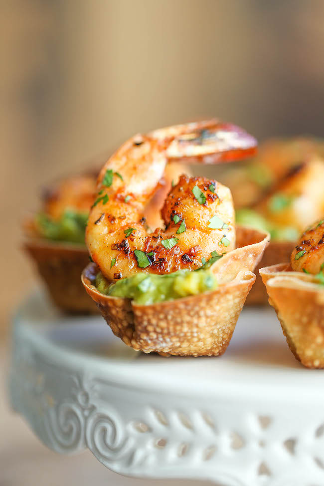 Guacamole Shrimp Wonton Cups - Crisp wonton cups filled with guacamole and cajun grilled shrimp. A quick and easy appetizer sure to impress everyone!