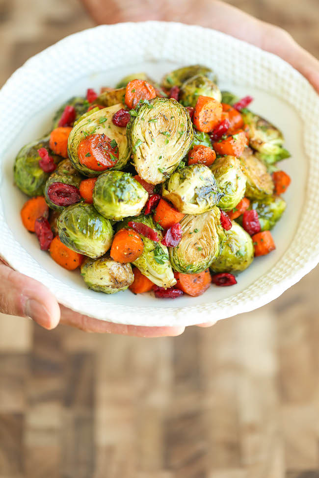 Balsamic Roasted Brussels Sprouts and Carrots - Golden brown, crisp brussels sprouts and carrots tossed in balsamic vinegar and maple syrup. Simply AMAZING!
