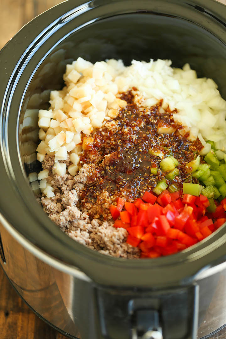 Slow Cooker Teriyaki Chicken and Rice - Saucy chicken, rice and veggies come together so easily right in the crockpot. Sure to be a weeknight staple!