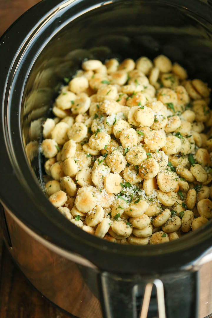 Slow Cooker Parmesan Ranch Oyster Crackers - Perfect for snacking or feeding a large crowd. They're just so addicting, and you won’t be able to stop!