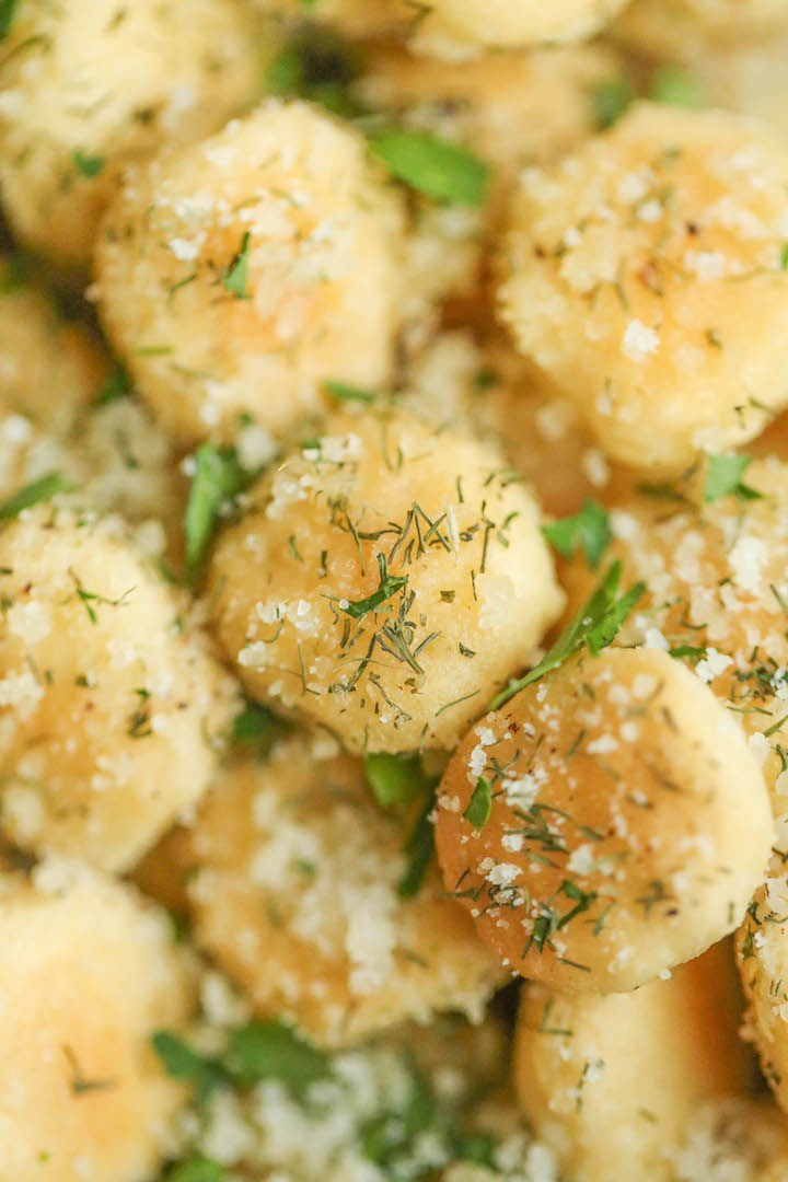 Slow Cooker Parmesan Ranch Oyster Crackers - Perfect for snacking or feeding a large crowd. They're just so addicting, and you won’t be able to stop!