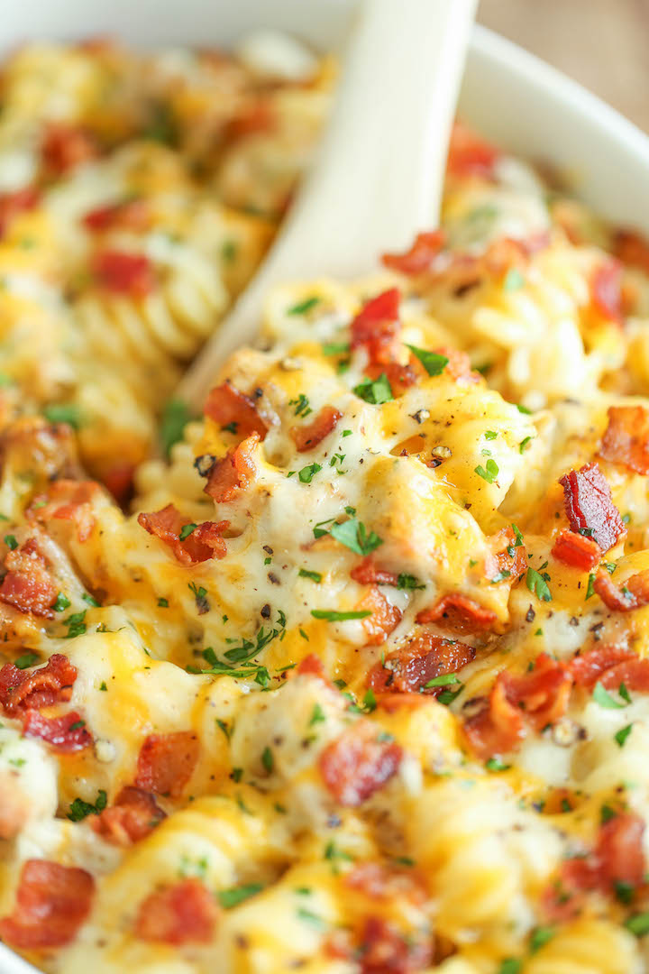 Chicken Bacon Ranch Casserole - Creamy, cheesy and comforting! Loaded with Ranch chicken, homemade alfredo sauce and bacon. Can be made ahead of time!