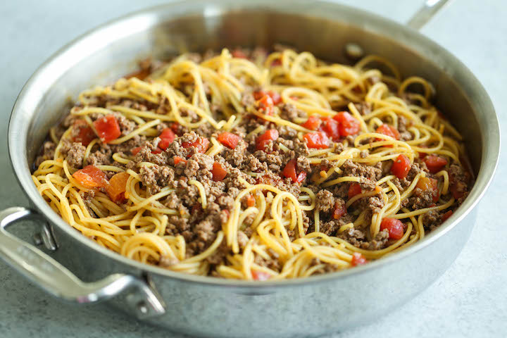 One Pot Taco Spaghetti - All your favorite flavors of tacos in spaghetti form - made in ONE PAN!  So cheesy, comforting and stinking easy with no clean-up!