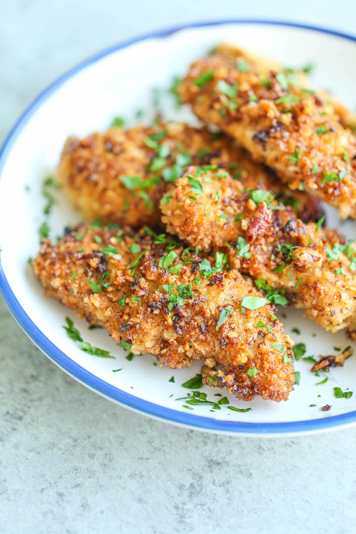 Honey Mustard Chicken Fingers - Heart-healthy chicken tenders completely baked in an AMAZING mustard sauce and coated with a nutty crunchy pecan crust!