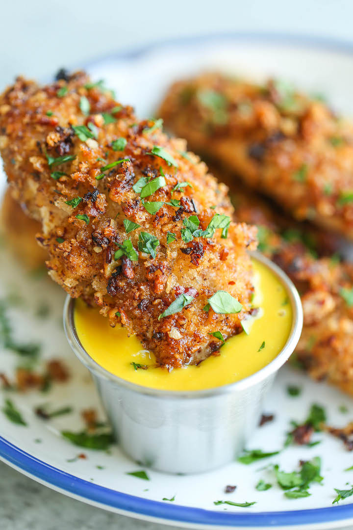 Honey Mustard Chicken Fingers - Heart-healthy chicken tenders completely baked in an AMAZING mustard sauce and coated with a nutty crunchy pecan crust!