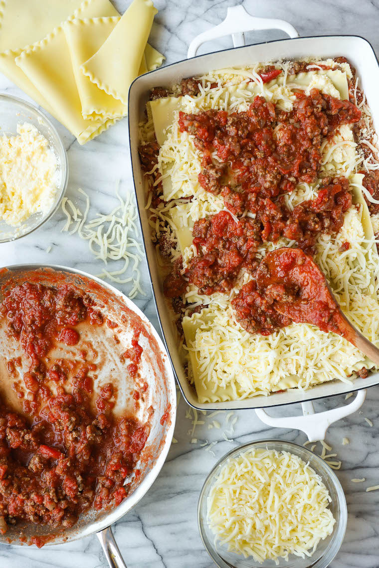 Easiest Lasagna Ever - Nothing beats classic lasagna. And this is the easiest recipe you will ever make. It can be made ahead and it's freezer-friendly too!