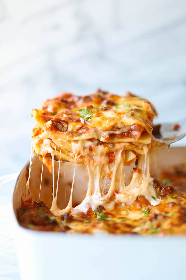 Easiest Lasagna Ever - Nothing beats classic lasagna. And this is the easiest recipe you will ever make. It can be made ahead and it's freezer-friendly too!