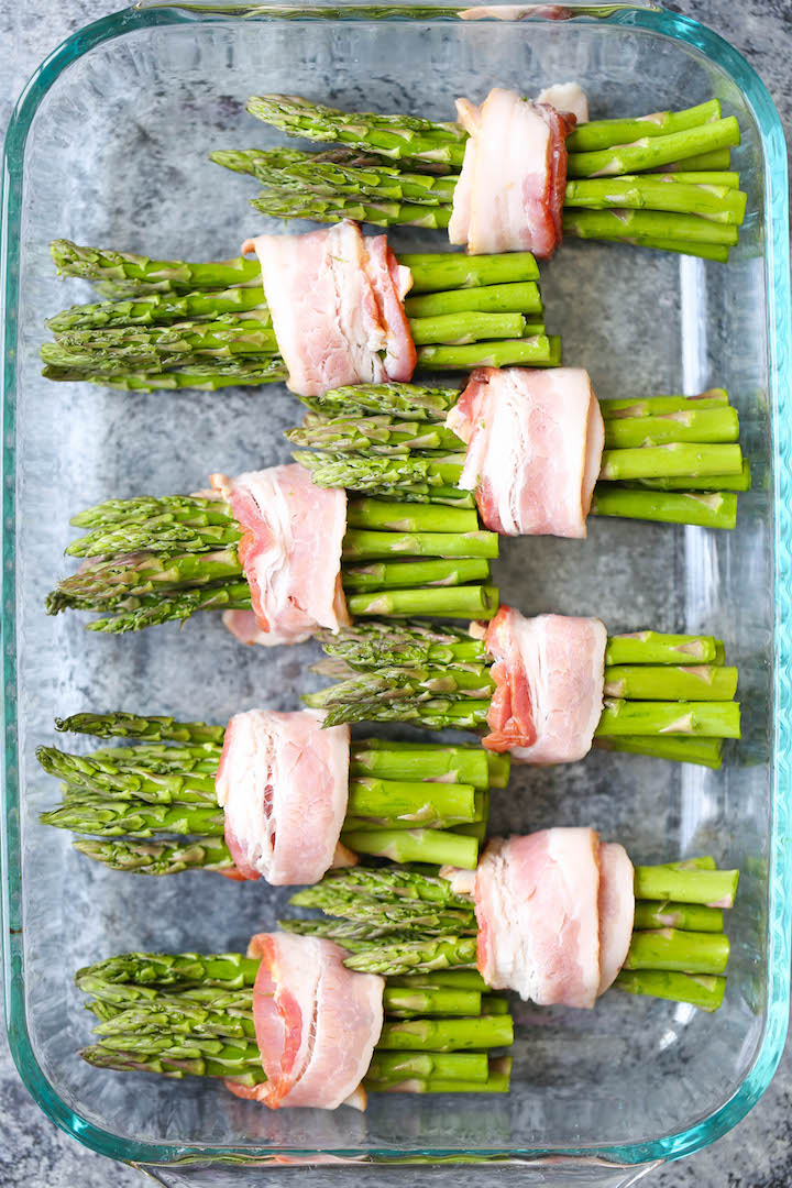 Bacon Wrapped Asparagus - Asparagus bundles wrapped in crisp-tender bacon in a buttery brown sugar glaze - grilled or baked! Can be prepped in advance!