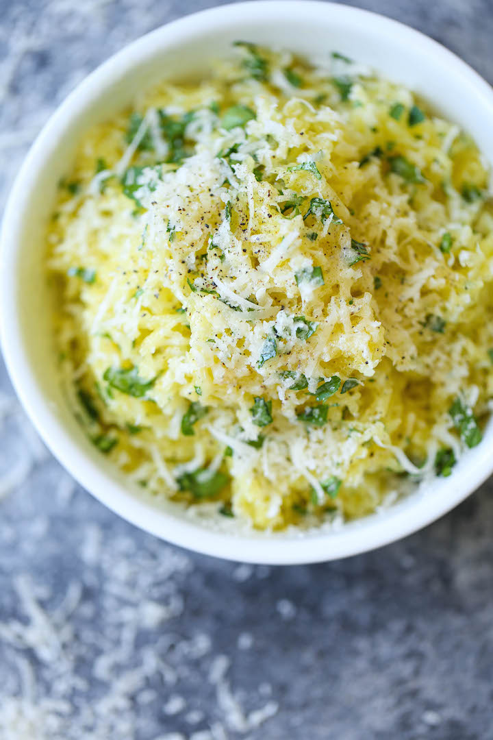 Garlic Parmesan Spaghetti Squash - Roasted spaghetti squash tossed in butter, garlic and plenty of fresh Parmesan cheese. It's simple, healthy and low-carb! 410 calories.