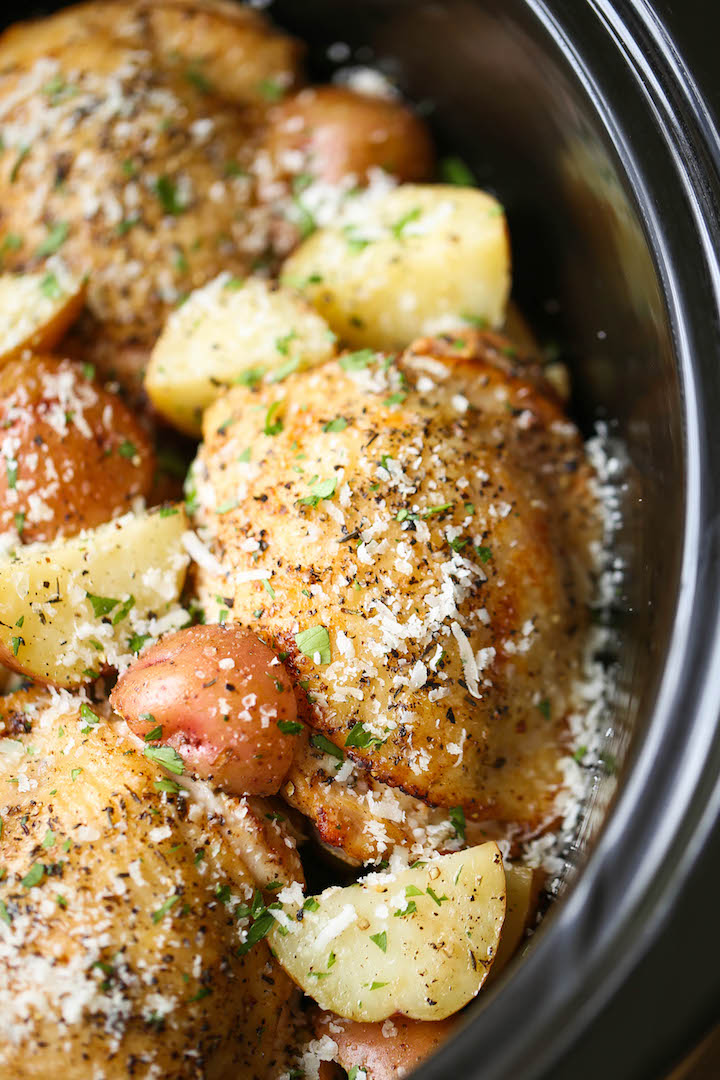 Slow Cooker Garlic Parmesan Chicken and Potatoes - Crisp-tender chicken cooked low and slow with baby red potatoes for a full meal! So easy and effortless!