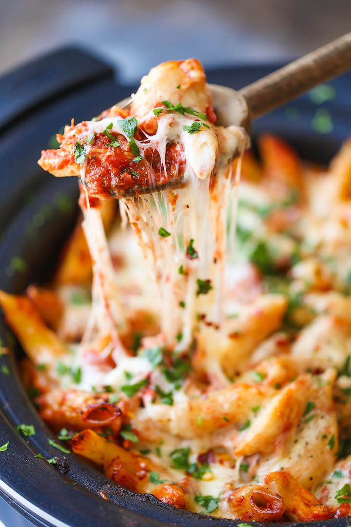 Slow Cooker Chicken Parmesan Pasta - Save time/effort and make everyone's FAVORITE Italian dish in your crockpot. You can also freeze half for another meal!