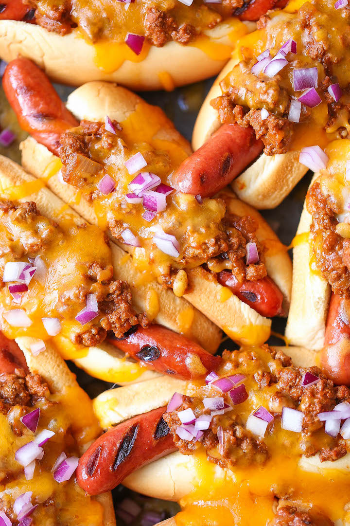 Baked Chili Cheese Dogs - A guaranteed crowd favorite. Promise! So easy to make and you can bake it right in the oven for that melted cheesy goodness! YES!