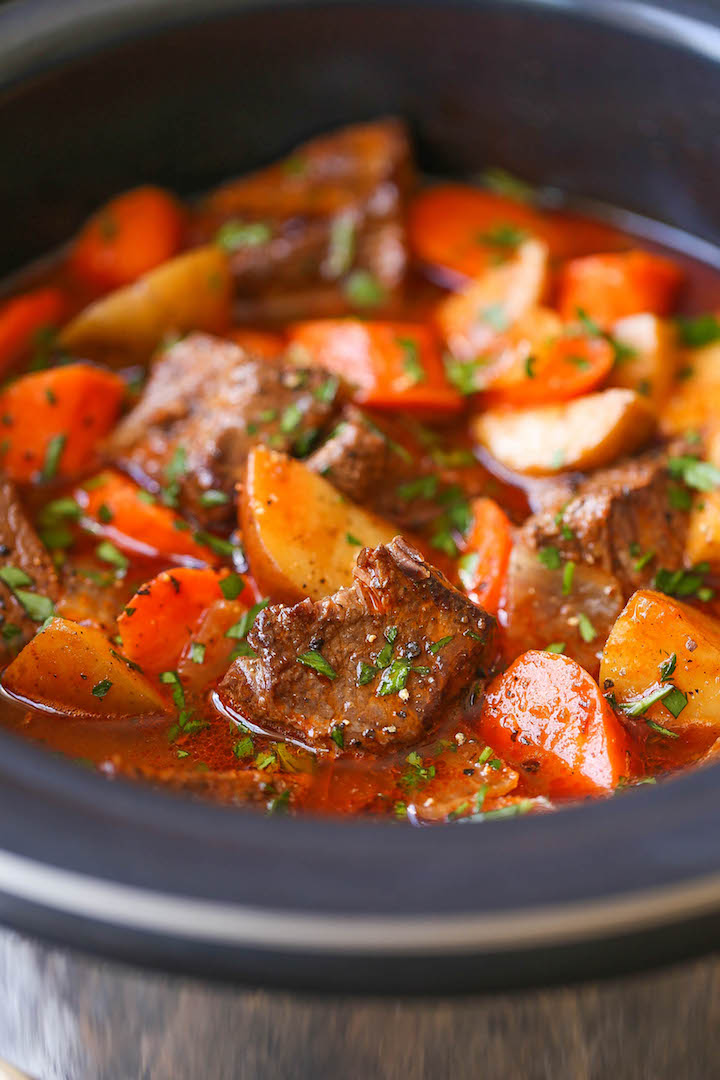 Slow Cooker Beef Stew - Everyone's favorite comforting beef stew made easily in the crockpot! The meat is SO TENDER and the stew is rich, chunky and hearty!