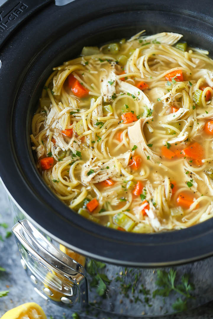 Slow Cooker Chicken Noodle Soup - Made right in the crockpot! So hearty, comforting and soothing. Perfect during the cold weather or fighting off a cold!