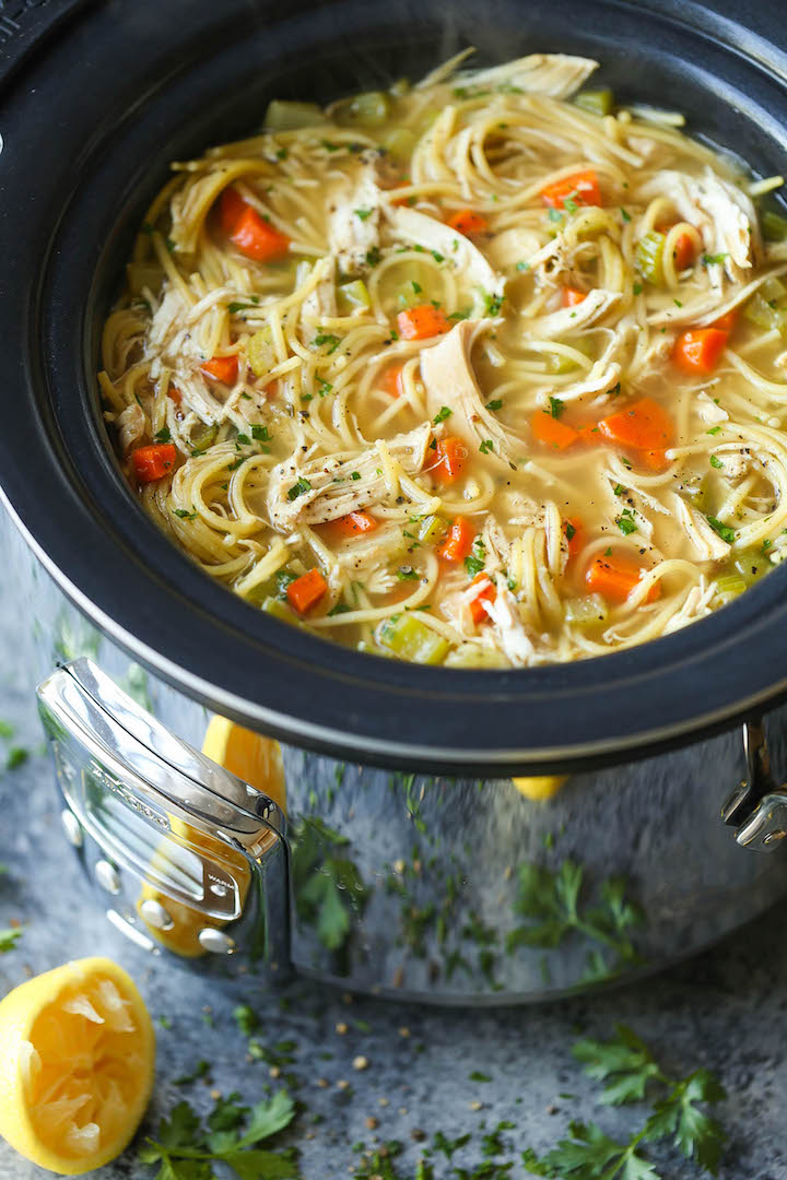 Slow Cooker Chicken Noodle Soup - Made right in the crockpot! So hearty, comforting and soothing. Perfect during the cold weather or fighting off a cold!