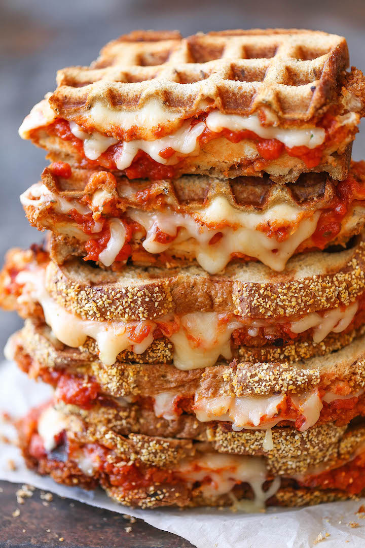Chicken Parmesan Grilled Cheese - Chicken breasts breaded/fried, smothered with tomato sauce and covered with mozzarella - all neatly in a cheesy sandwich!!